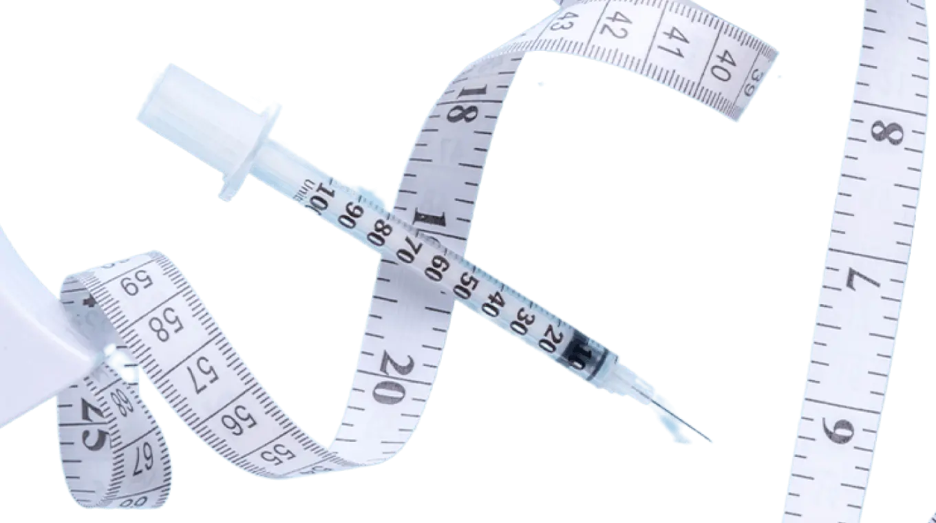 Measurement tape with syringe