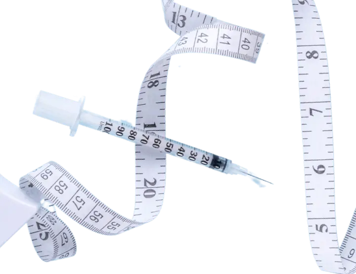 Measurement tape with syringe